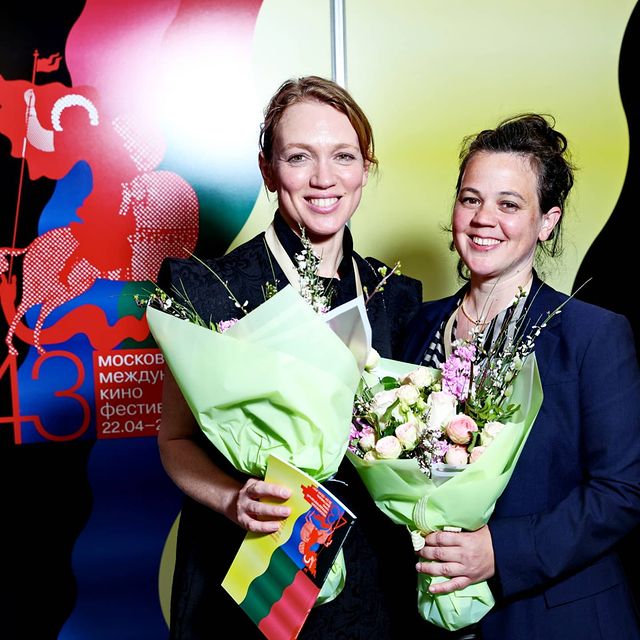 Ruthy pribar and Alenayiv holding flowers